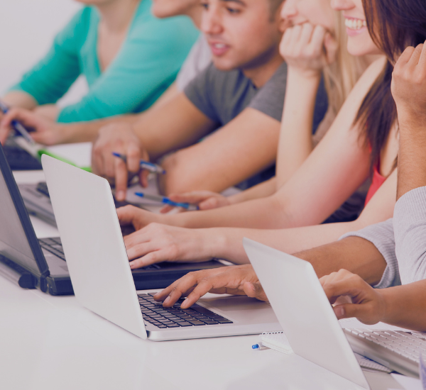 students studying together with laptop